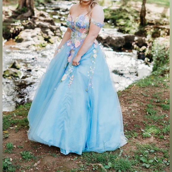 Blue lace prom dress with multicolored flowers sewn on. - Picture 2 of 4